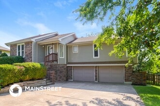 407 N Washington St in Raymore, MO - Building Photo - Building Photo