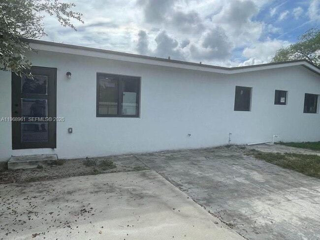 property at 3051 NW 102nd St