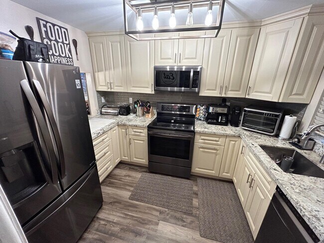 9410 Tangerine Pl-Unit -403 in Davie, FL - Foto de edificio - Building Photo