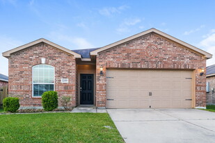 12019 Fairquarter Ln in Pinehurst, TX - Building Photo
