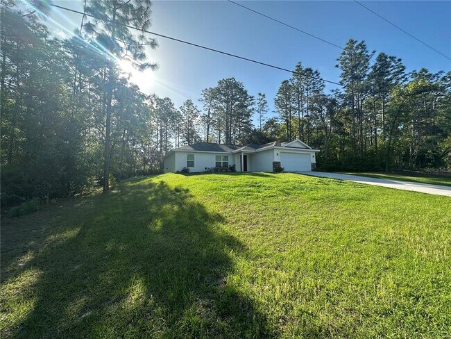 9889 N Langdon Rd in Citrus Springs, FL - Building Photo - Building Photo