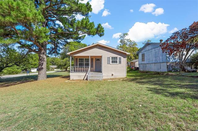 1223 W Nelson St in Denison, TX - Foto de edificio