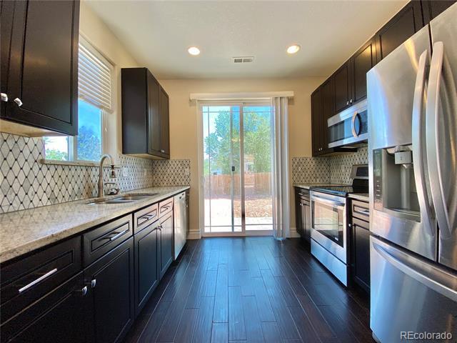 948 S Utica St in Denver, CO - Building Photo - Building Photo