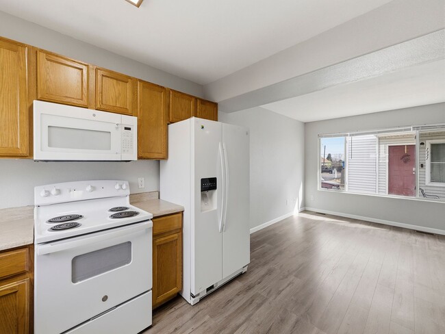 Spacious Townhome with Functional Layout in Evans, CO - Building Photo - Building Photo