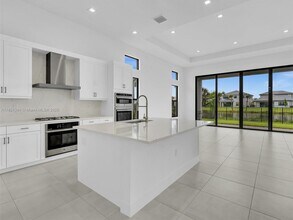 10032 Stockrun Dr in Palm Beach Gardens, FL - Building Photo - Building Photo