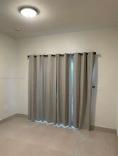 1661 SE 29th Ct, Unit 103 in Homestead, FL - Foto de edificio - Building Photo