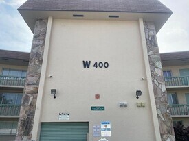 400 Village Green Cir W in Palm Springs, FL - Building Photo