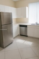 6960 SW 39th St, Unit #E106 in Davie, FL - Building Photo