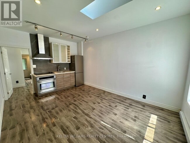 property at 221 Coxwell Ave