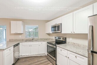 8814 Elm Leaf Ct in Port Richey, FL - Foto de edificio - Building Photo