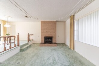 5855 Whispering Ln in Titusville, FL - Building Photo - Building Photo