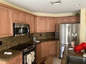 7148 Crescent Creek Pl in Coconut Creek, FL - Building Photo - Building Photo