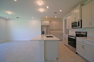 14050 SW Thorens Dr in Port St. Lucie, FL - Building Photo - Building Photo