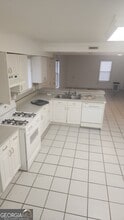 1383 Lilburn Stone Mountain Rd in Stone Mountain, GA - Building Photo - Building Photo