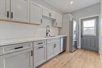 1259-1254 S Muirfield Rd in Los Angeles, CA - Building Photo - Building Photo