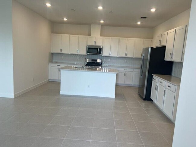 1215 Tangled Orchard Tr in Loxahatchee, FL - Building Photo - Building Photo