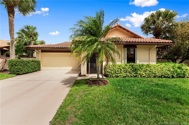 property at 3281 SW Bobalink Way