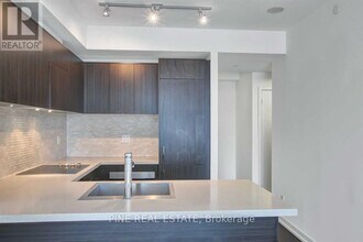 21-3421 Widmer St in Toronto, ON - Building Photo - Building Photo