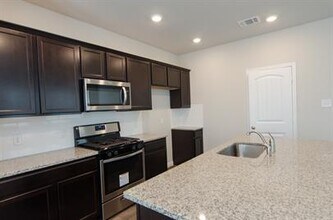 256 Cherry Laurel Ln in Niederwald, TX - Building Photo - Building Photo