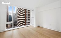 135 W 52nd St in New York, NY - Building Photo - Building Photo