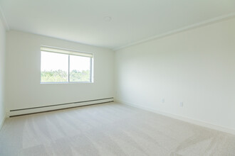 18 George St, Unit 1Br in Stoneham, MA - Foto de edificio - Building Photo