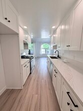 14572 Dickens St, Unit 105 in Los Angeles, CA - Building Photo - Building Photo
