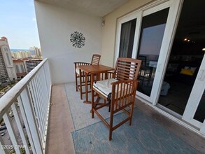 9860 S Thomas Dr in Panama City Beach, FL - Building Photo - Building Photo