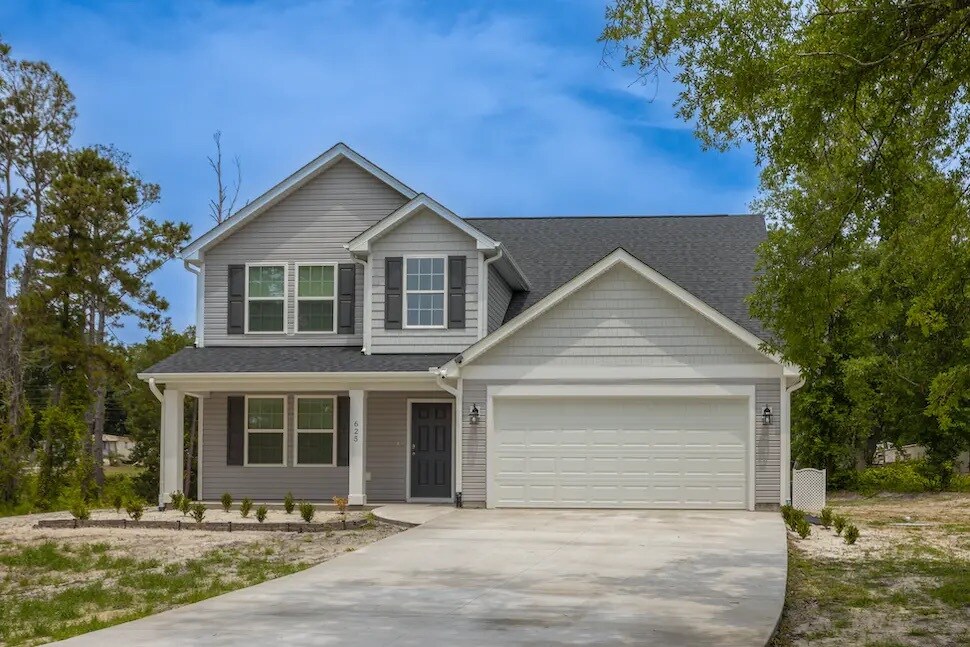625 Millslough Ln in Sunset Beach, NC - Building Photo