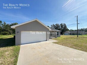 297 Malauka Run in Ocklawaha, FL - Building Photo - Building Photo