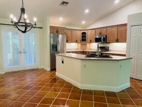 14425 64th Ct N in The Acreage, FL - Foto de edificio - Building Photo