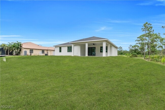 708 Poinsettia Ave in Lehigh Acres, FL - Building Photo - Building Photo