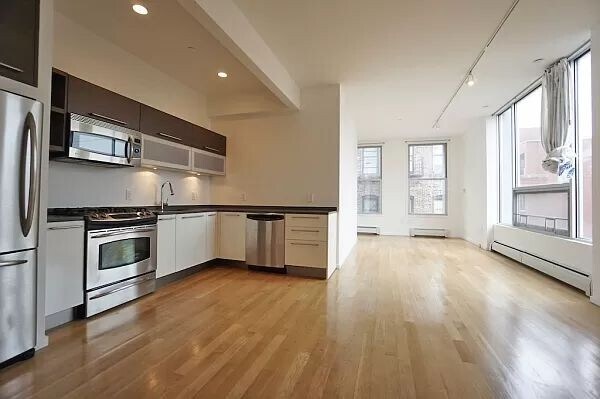 232 E 118th St in New York, NY - Building Photo