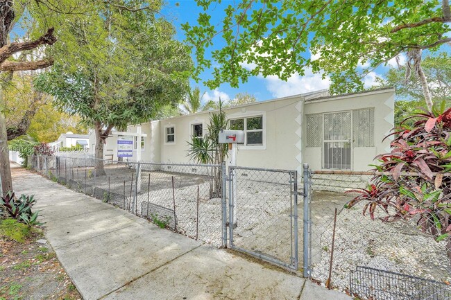 property at 299 NW 43rd St