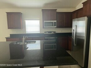 1343 Musgrass Cir in West Melbourne, FL - Building Photo - Building Photo