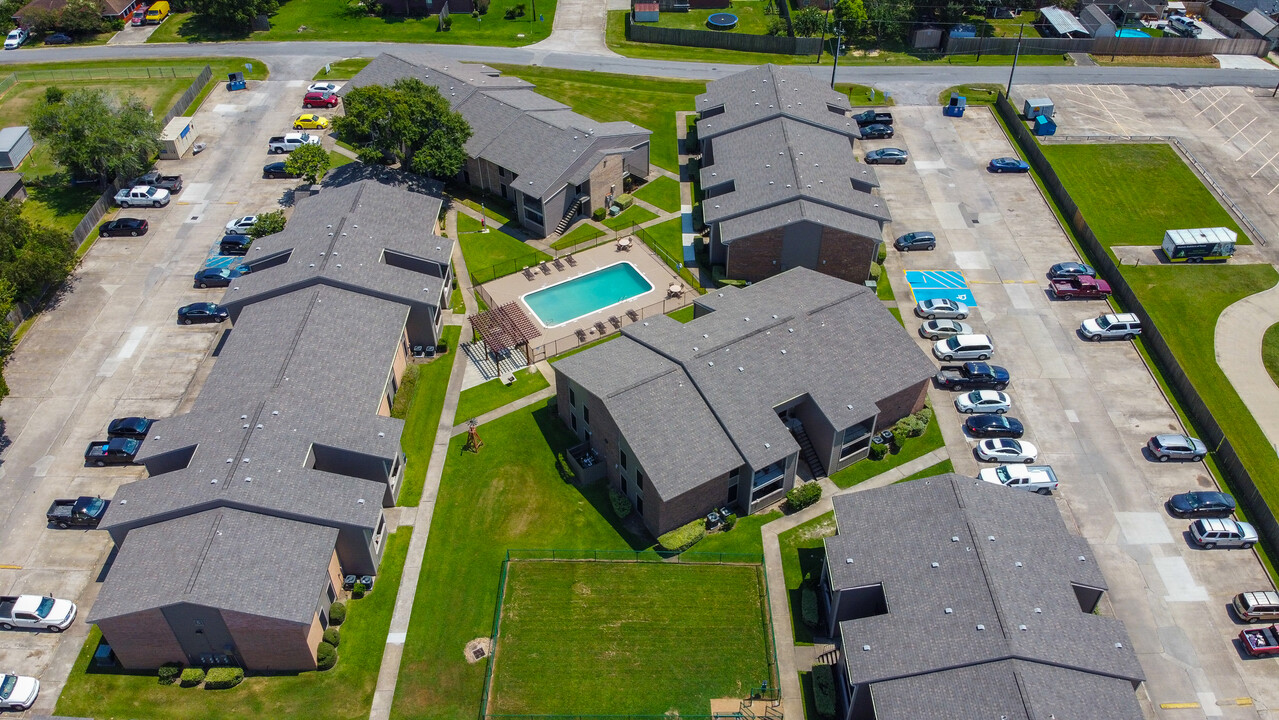 Carriage House Apartments in Nederland, TX - Building Photo