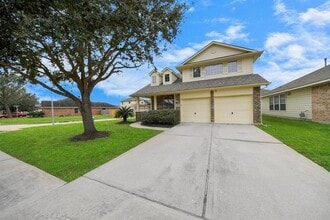7447 Oakwood Canyon Dr in Cypress, TX - Foto de edificio - Building Photo