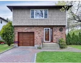 163 Latham Rd in Mineola, NY - Building Photo