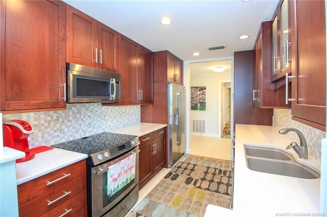 property at 150 SE Four Winds Dr