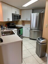 2351 Douglas Rd, Unit 1110 in Miami, FL - Building Photo - Building Photo