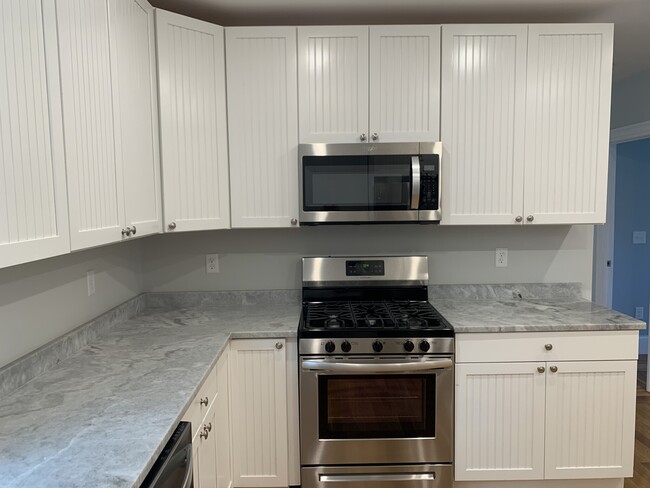 307 Highland Ave, Unit 1 in Somerville, MA - Foto de edificio - Building Photo