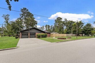1703 N Roberson St in Conroe, TX - Building Photo - Building Photo