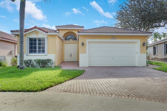 5334 Osprey St in Coconut Creek, FL - Building Photo - Building Photo