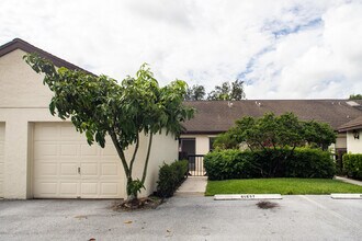 1544 SW Silver Pine Way-Unit -104 in Palm City, FL - Building Photo - Building Photo