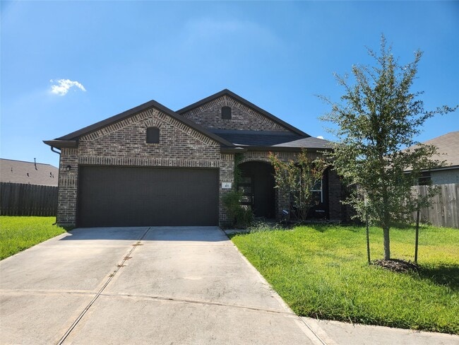 property at 411 Alaska Cedar Dr