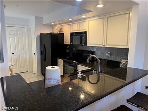 13070 Amberley Ct, Unit 902 in Bonita Springs, FL - Building Photo - Building Photo