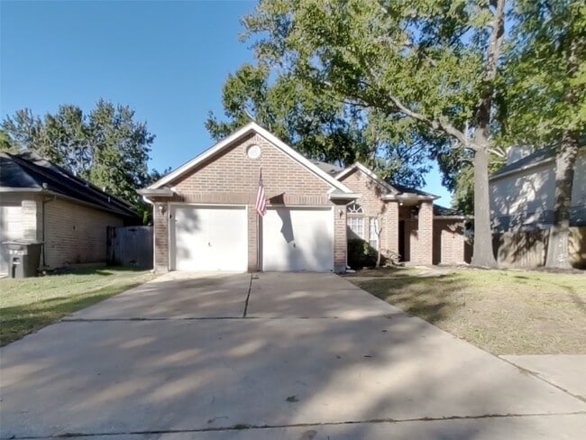 property at 18707 Singing Woods Dr