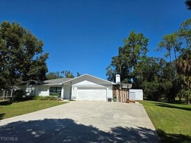 21151 Captain Nelson Ct in Alva, FL - Building Photo