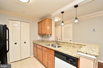 14162 Cuddy Loop-Unit -201 in Woodbridge, VA - Building Photo - Building Photo