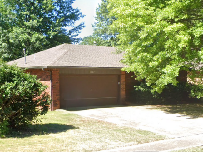 property at 1112 W McGee St