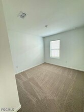 1179 Caloosa Crk Dr in La Belle, FL - Building Photo - Building Photo